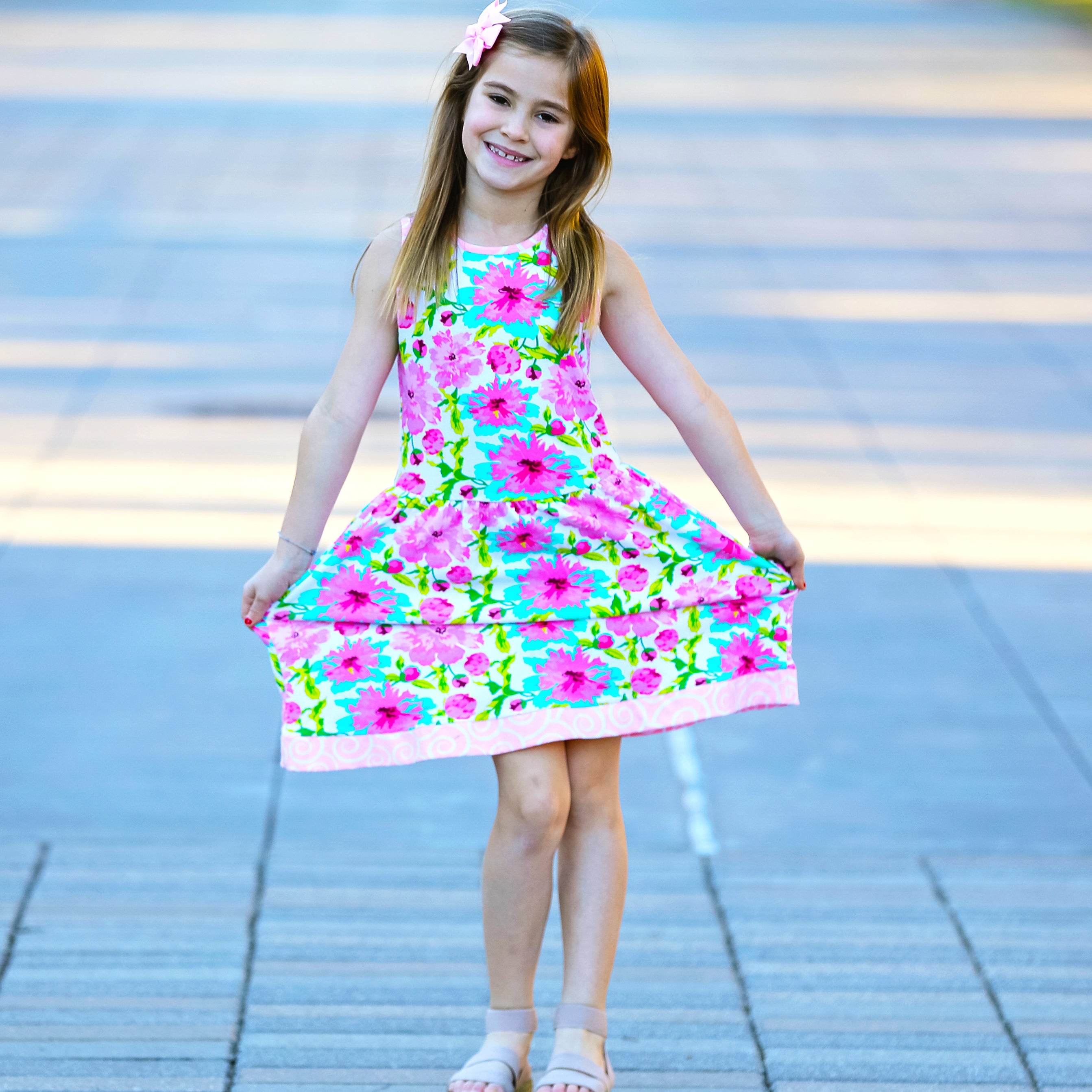 AnnLoren Little & Big Girls Floral Dress in green and pink, showcasing a vibrant floral pattern and sleeveless design, perfect for spring and summer.